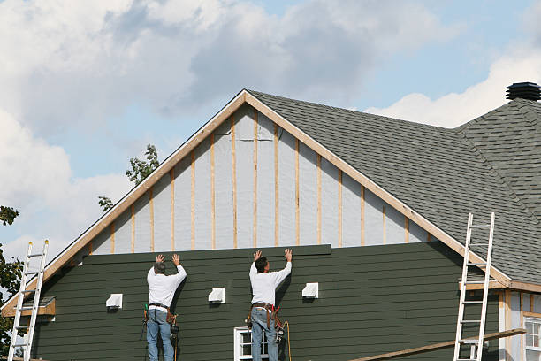 Professional Siding technician working in Needham Heights, MA